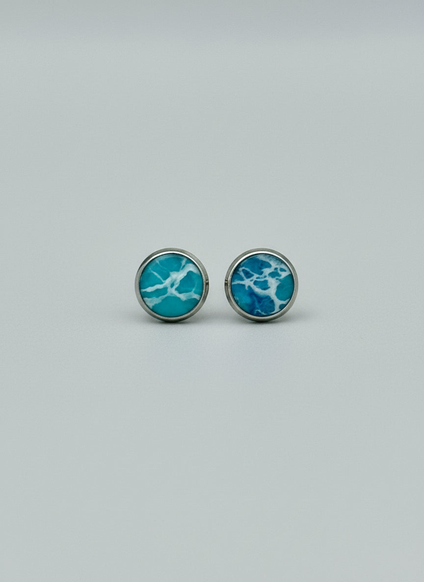 pair of resin earrings teal 