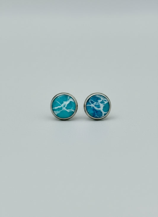 pair of resin earrings teal 