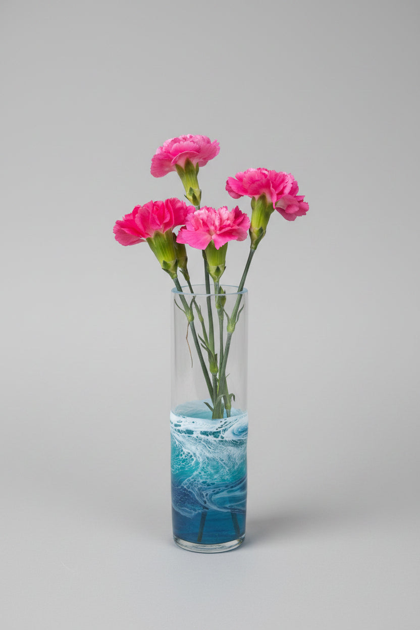 glass bud vase with blue and white resin waves 
