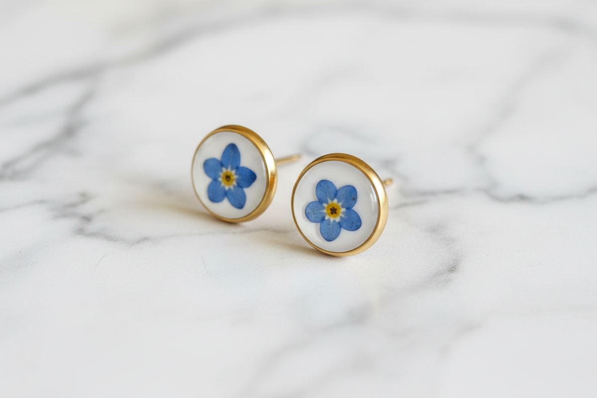 Forget Me Not Earrings – Marble Surface Angled Shot