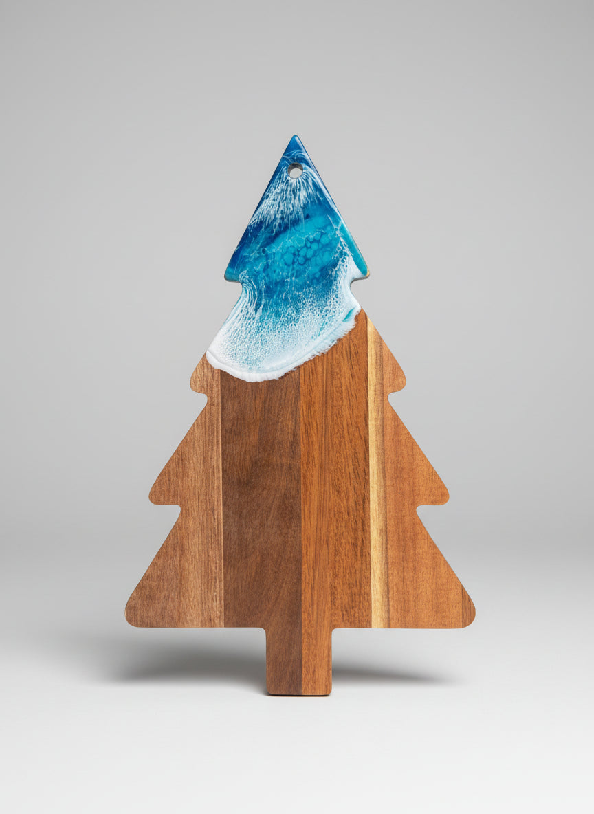 wooden charcuterie board christmas tree shape with blue resin wave accent 